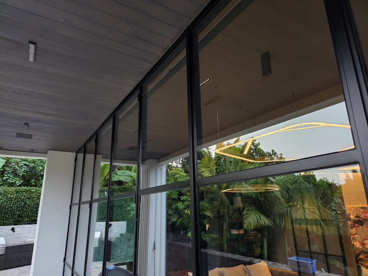 Crystal clear floor-to-ceiling windows on a modern Auckland home