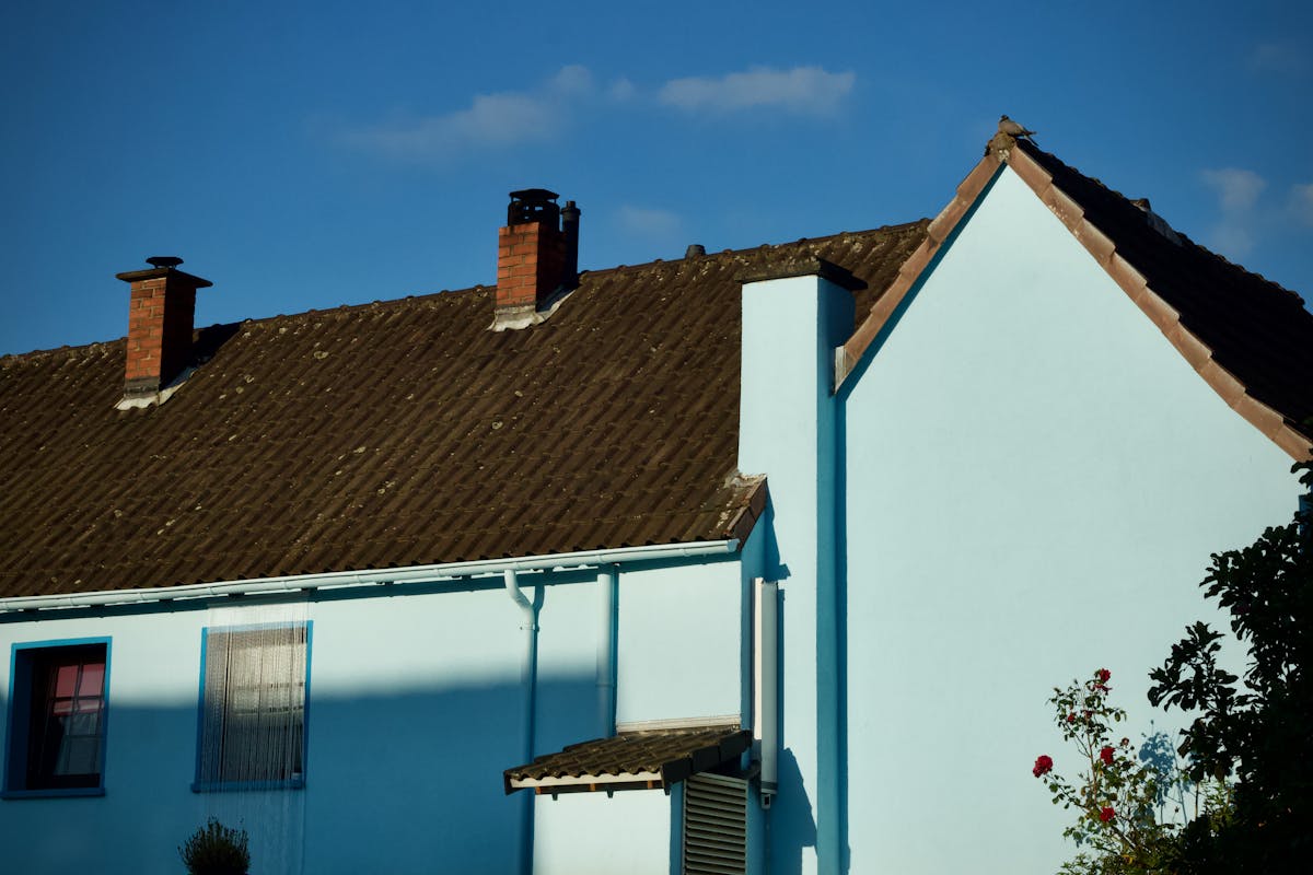 Clean house exterior after professional house wash